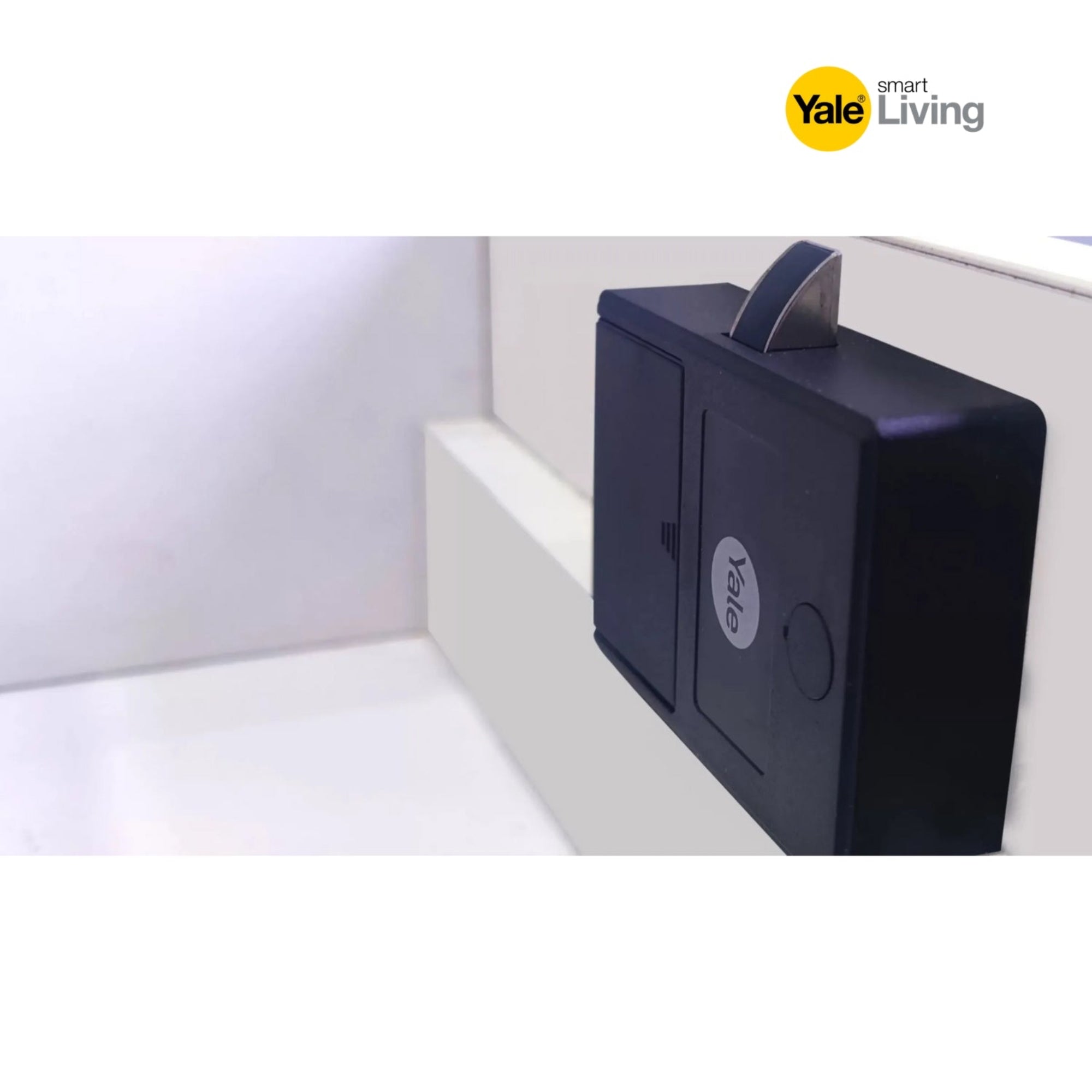 Yale smart living device on a white surface with 'Yale' branding.